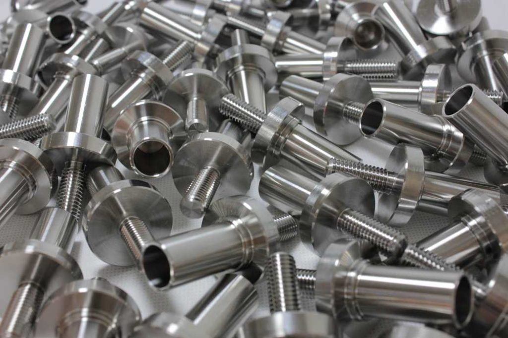 Batch of stainless steel turned components